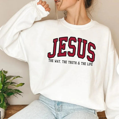 Actual white JESUS varsity crewneck sweatshirt on a model
