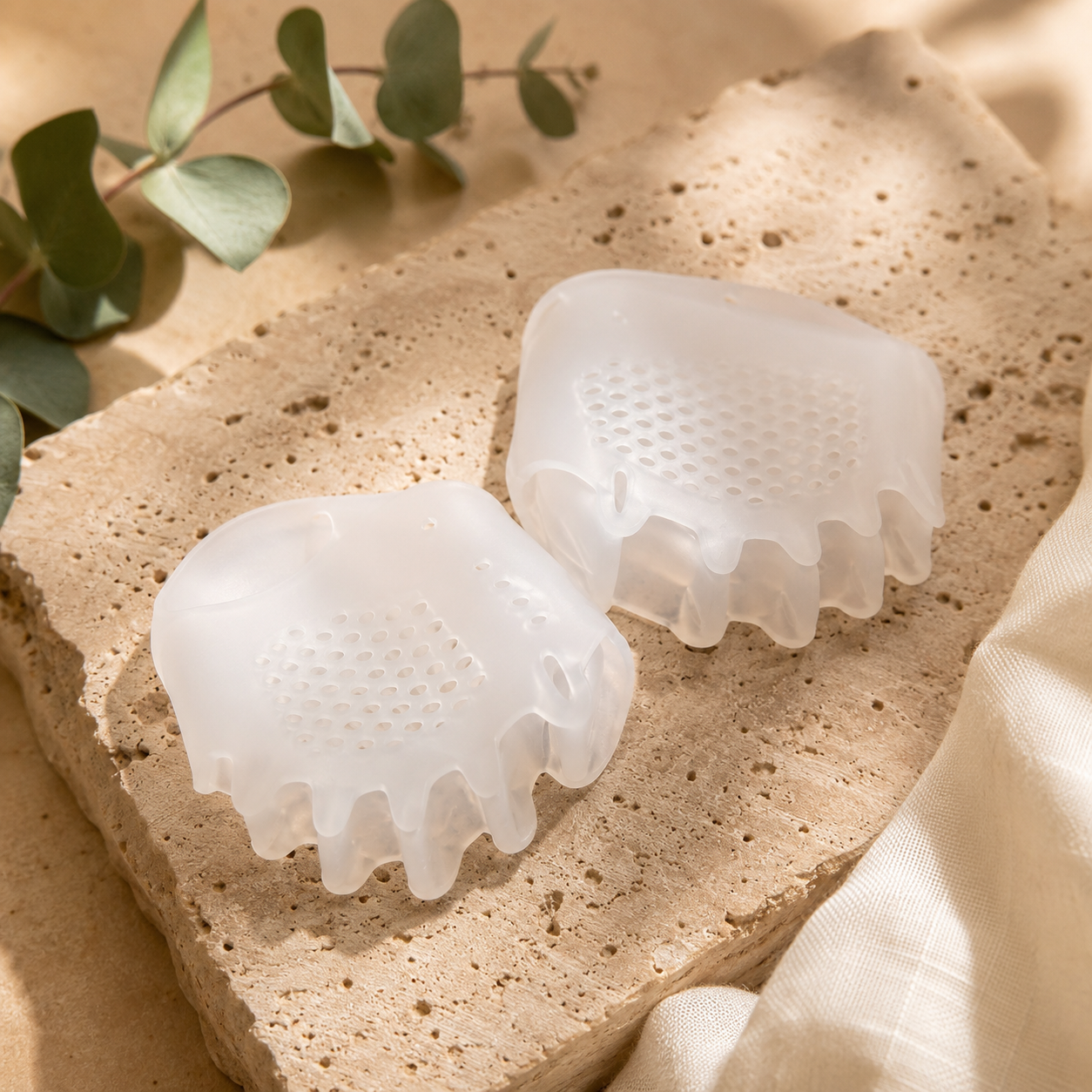 Taileva Toe Separators pair on travertine
